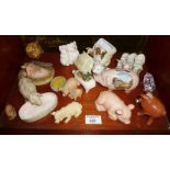 Collection of pig figurines, some A/F