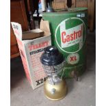 Old Castrol motor oil can with tap and a Tilley lamp