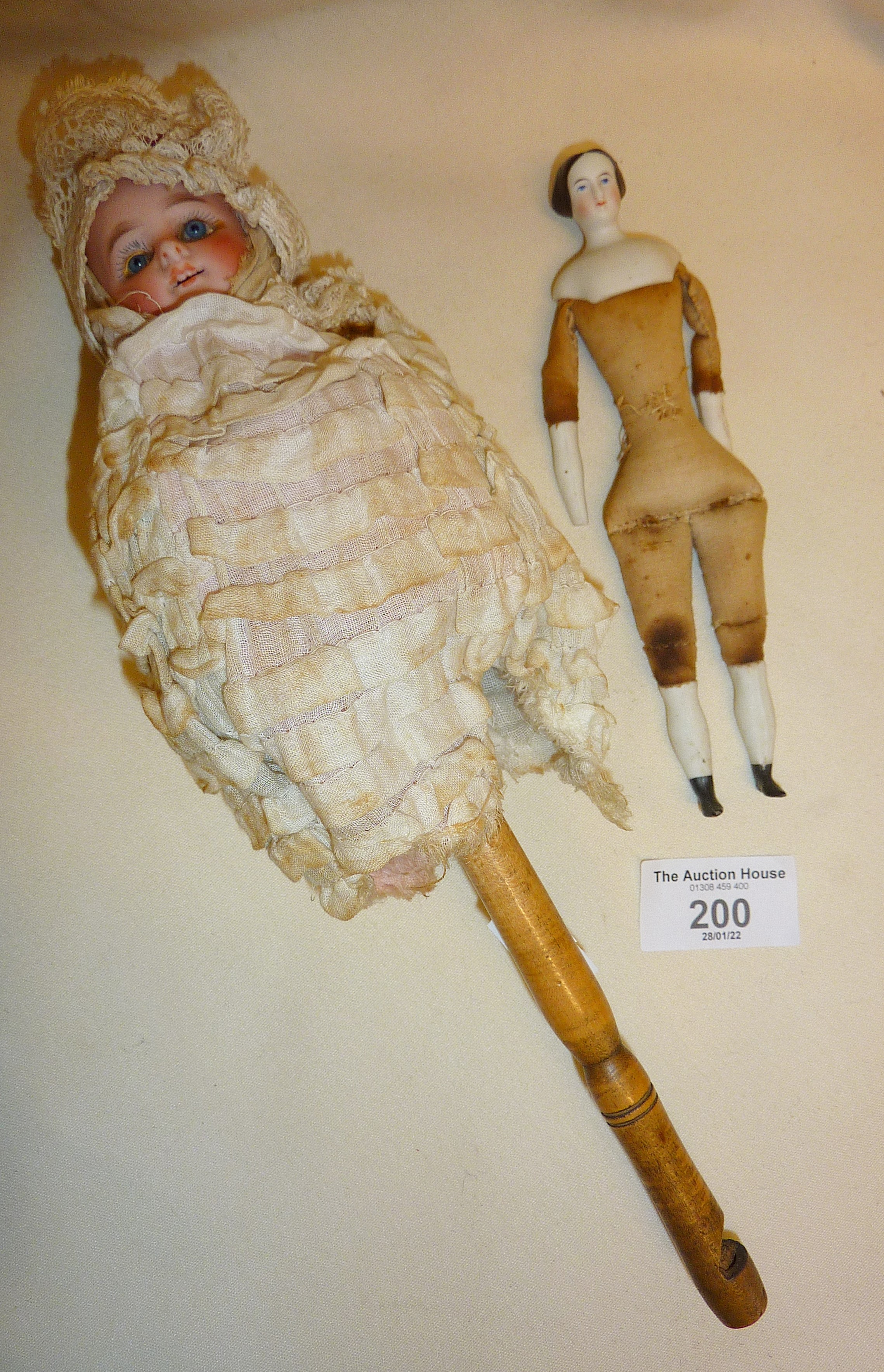 Antique Party Marotte twirling musical doll with bisque head, glass eyes and whistle tip handle, - Image 2 of 6
