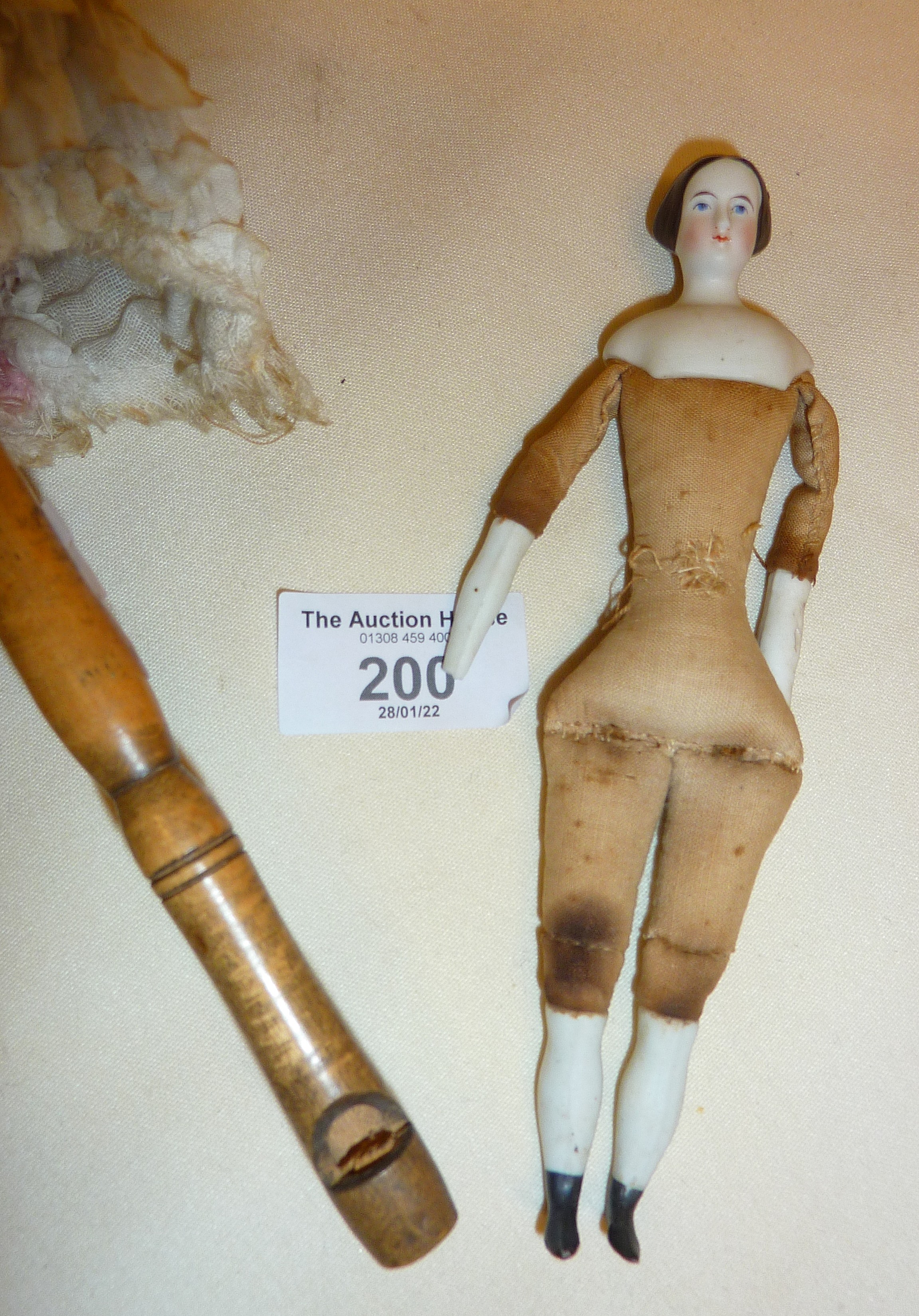 Antique Party Marotte twirling musical doll with bisque head, glass eyes and whistle tip handle, - Image 3 of 6