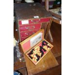 Old oak drop front collector's chest, a wood chess and draughts set