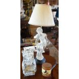 Porcelain cupid lamp base, Aztec-style seated man and a Chiquito cigar tin