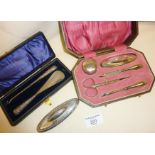 Hallmarked silver ladies vanity sets, a cased button hook and shoehorn with Sterling handles and a