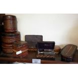 Collection of seven ethnic decorative leather covered boxes, inc. a safety razor box and a similar