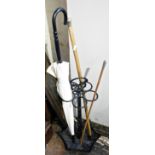 Silver topped walking cane, riding crop and umbrella in repro metal stick stand
