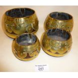 Tribal Art:- Early 20th c. Anglo-Indian coconut and brass set of four graduated Dhokra grain