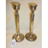 Pair of hallmarked silver candlesticks by Kemp Bros of Bristol