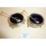 Pair of antique Sterling silver salts with blue glass liners (with different hallmarks), together