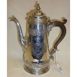 Heavy Georgian Sterling silver coffee pot with repoussé decoration. Hallmarked for London 1742,