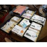 Three albums of first day covers and five trays of similar c. 1960's and 1970's