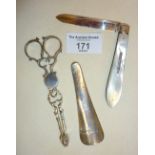 Sterling silver sugar nips, hallmarked for London 1908, Maurice Freeman, silver shoe horn and mother