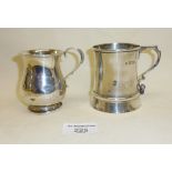 Two Sterling silver mugs or tankards, both hallmarked. Approx weight 197g