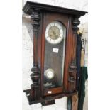 Victorian German mahogany cased wall clock striking on a gong