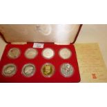 Pobjoy Mint cased set of seven Sterling silver Crowns and one 22ct gold on silver Crown medal