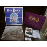 Royal Mint coin sets for 1984 and 1970, a 2014 quarter ounce silver coin in pack, and a 1998