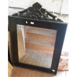 Wall mirror in black painted pine frame with carved pediment, 44" high x 29" wide