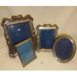 Four Sterling silver photo frames, all hallmarked (largest approx 25cm x 21cm)