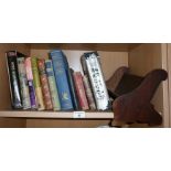 Assorted books and a wooden bookrack