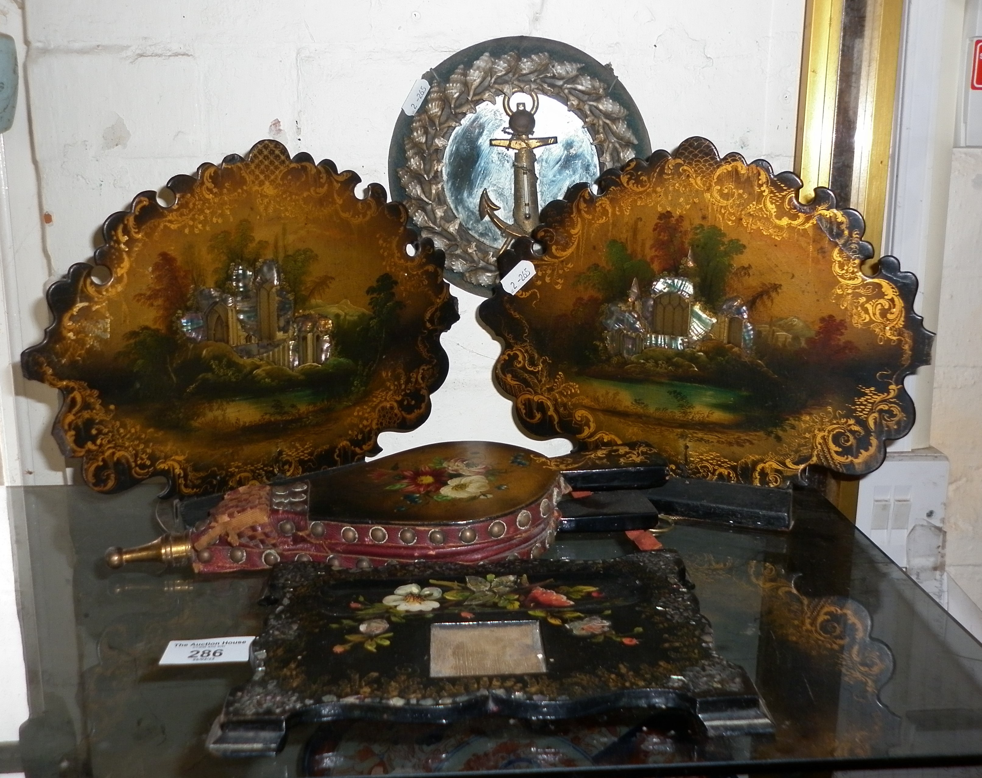 Pair Victorian lacquered papier mache bookends, a similar inkstand, bellows and a shells framed