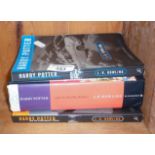 Three various Harry Potter books