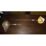 Pair of Georgian silver or silver plated brandy toddy ladles with twisted baleen handles - one