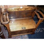 Oak hallstand settle with integral umbrella and stick stands to sides