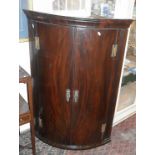 19th c. mahogany corner cabinet