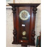 Victorian German mahogany cased wall clock striking on a gong