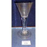 Trumpet bowl wine glass on stem with air tear and stepped conical foot, height 16cm