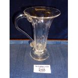 18th c. single handled jelly glass with extruded handle on stepped conical foot,(internal flaw)
