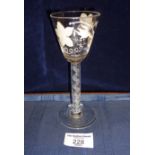 18th c. engraved wine glass - its round funnel bowl decorated with vine leaves and having spiral air