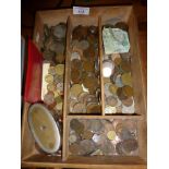 Old coins in a cutlery tray