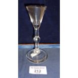 18th c. wine glass with funnel bowl above smooth single knopped stem, height 13cm