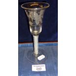 18th c. engraved wine glass with moth and vine leaf decoration on an air twist stem, height 16cm