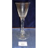 Georgian wine glass with faceted stem and petal shaped foot, height 16cm