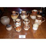 Miniature Doulton Lambeth stoneware jugs, etc.