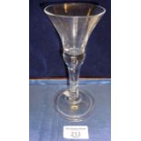 18th c. wine glass with trumpet bowl on tapering stem enclosing air tear on folded conical foot,