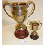 Silver trophies on wooden stands, both fully hallmarked, silver only approx total weight, 257g