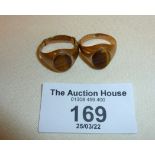 Two 9ct gold signet rings set with Tiger's Eye stones. Approx. UK size H and K, combined weight 4.