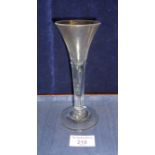 18th c. wine glass with tapering trumpet bowl and air tear to stem on folded foot, height 17cm