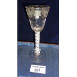 18th c. wine glass with faceted bell bowl having engraved vine leaves on double helix air twist stem