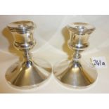 Pair of dwarf candlesticks, hallmarked silver (A/F)