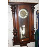 Victorian German mahogany cased wall clock striking on a gong