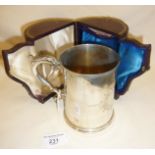 Fine and heavy silver pint tankard with bevelled glass bottom and case. Engraved with ornate