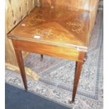 Late 19th c. inlaid mahogany envelope card table on square tapering legs