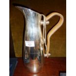 White metal modernist style wine ewer with some silver plated Grimwades tongs