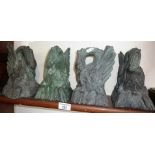 Four cast bronze gate or newel posts finials in the form of gryphons, 7" tall