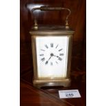 19th c. brass carriage clock with leather case (good working order)