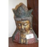 Oriental painted metal bust of a buddha, 20cm tall