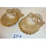 Two very similar silver scallop shell butter dishes, hallmarked for London 1952 and 1905 - maker's